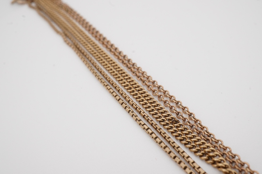 A 14k chain, 40cm, with a 9ct 'Imp' drop pendant, 47mm, together with a 9ct chain and a 9ct cross pendant on a yellow metal chain. Condition - poor to fair